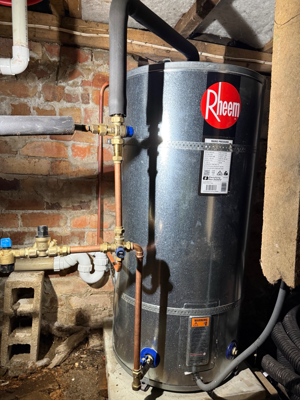 The new mains-pressure cylinder installed underfloor